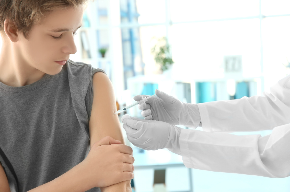 teenager receiving vaccine