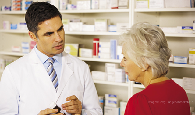 Pharmacist with Elderly Patient