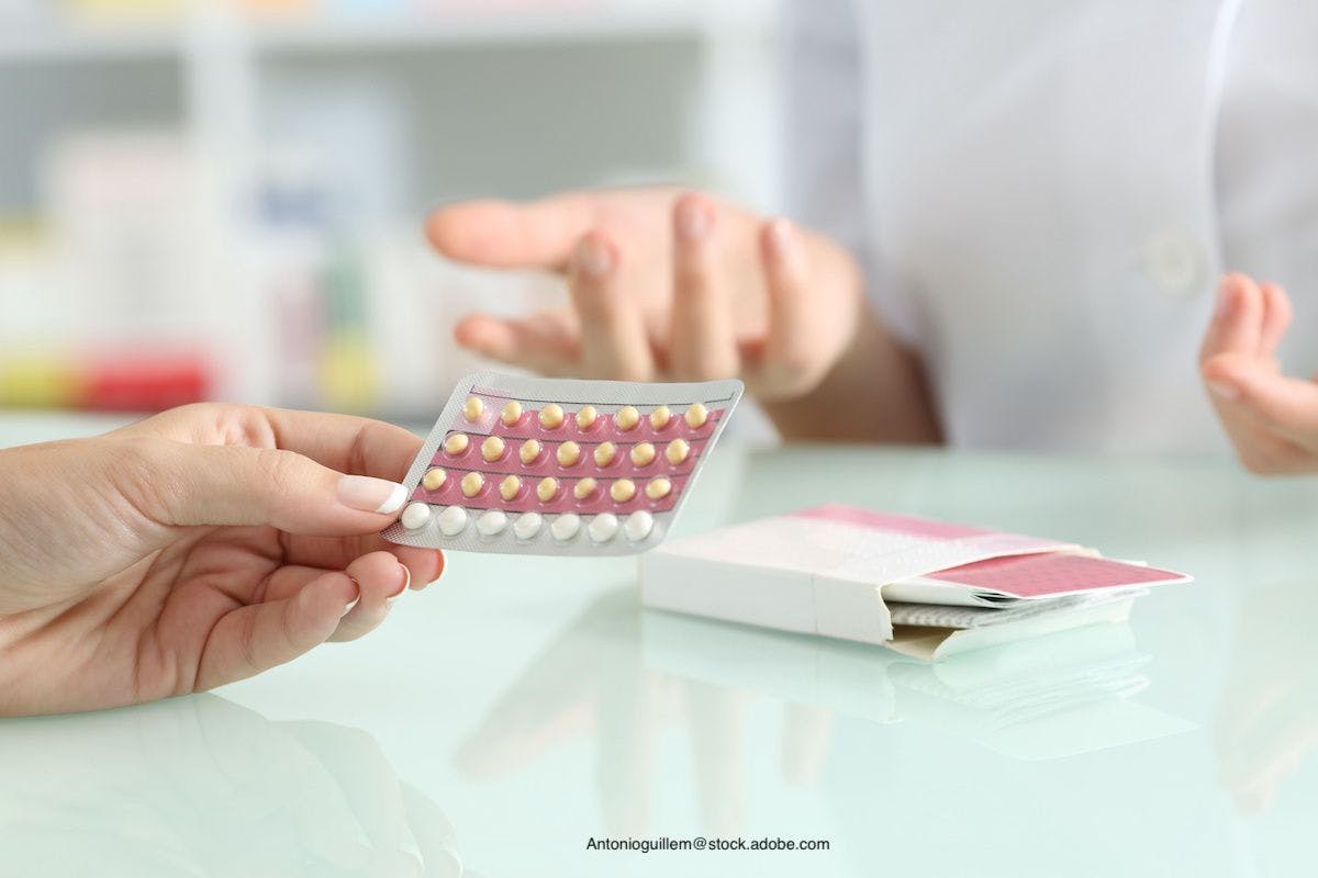 girl getting hormonal contraceptives at pharmacy