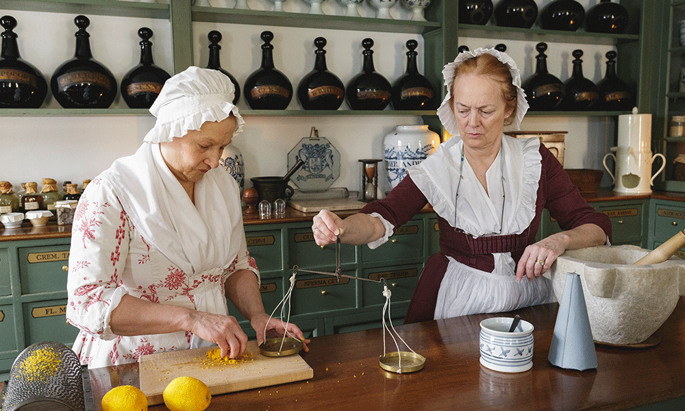 18th century women in apothecary shop