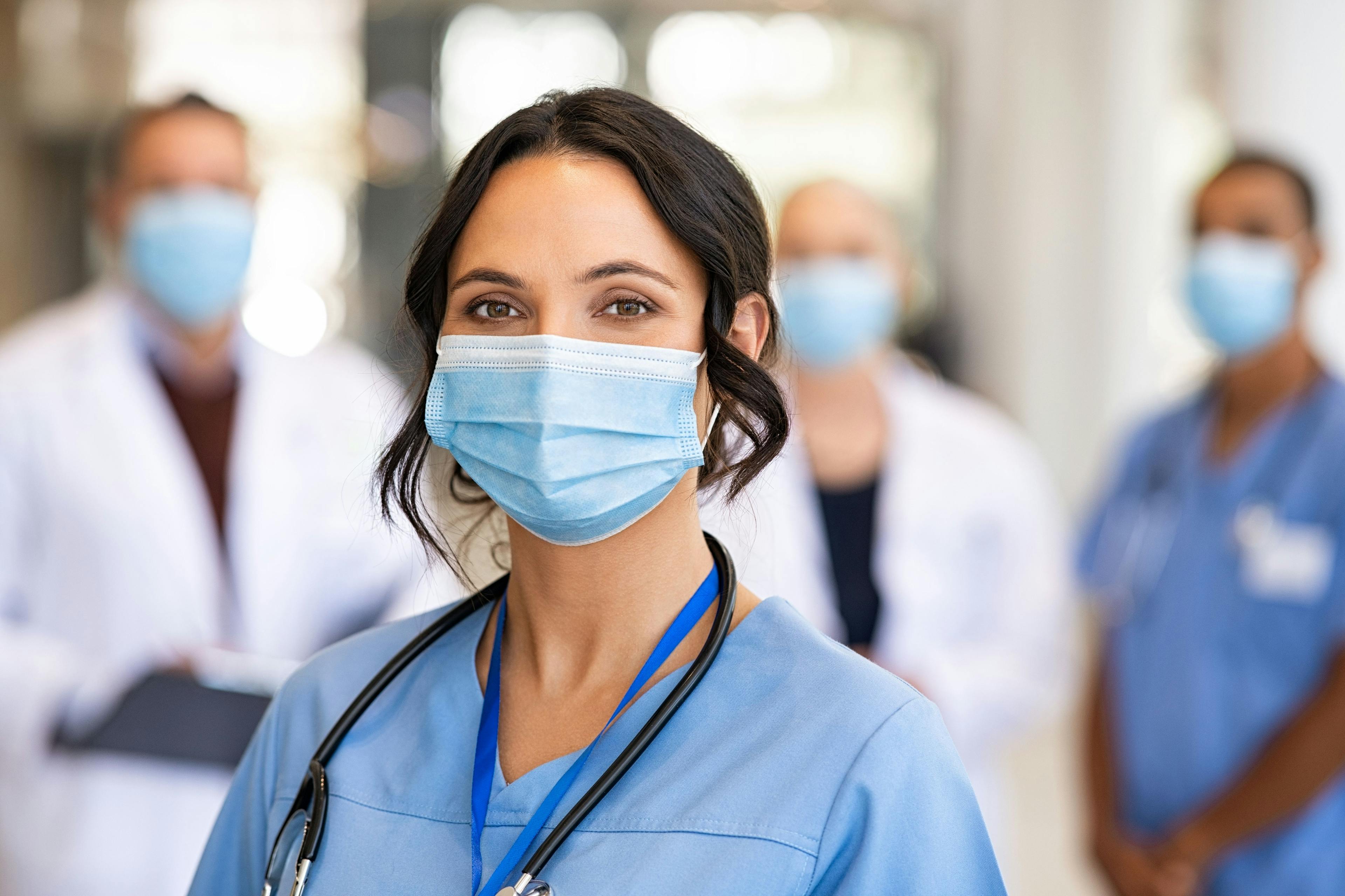 Should Health Care Workers Keep Wearing Masks With Patients Now That the COVID-19 Public Health Emergency Is Over?
