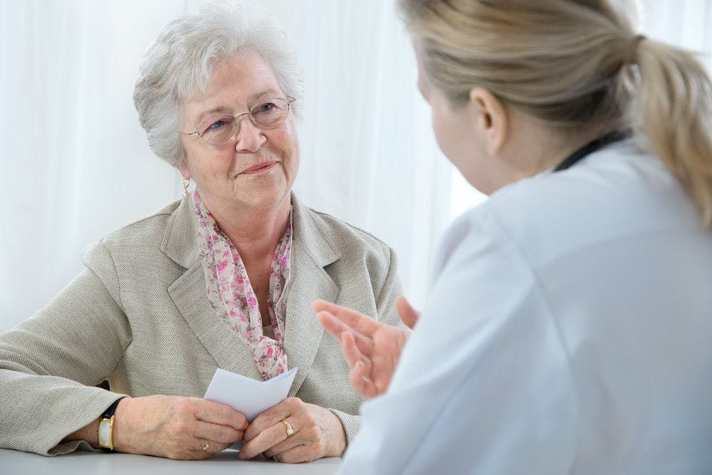 Older woman with pharmacist